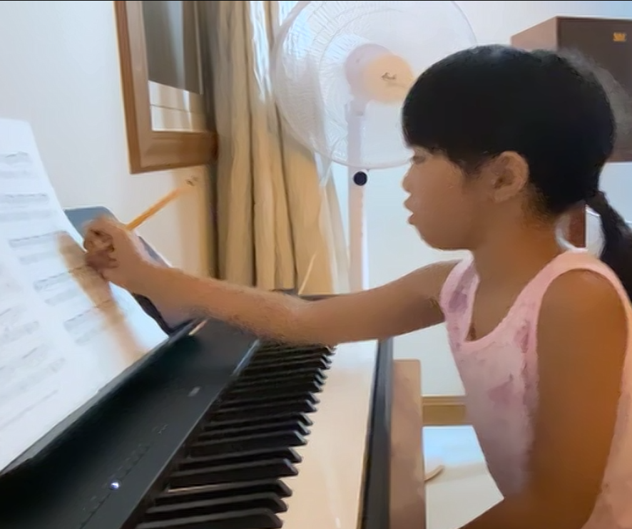 Pia Ramos, one the parents of Teacher Paolo's piano students